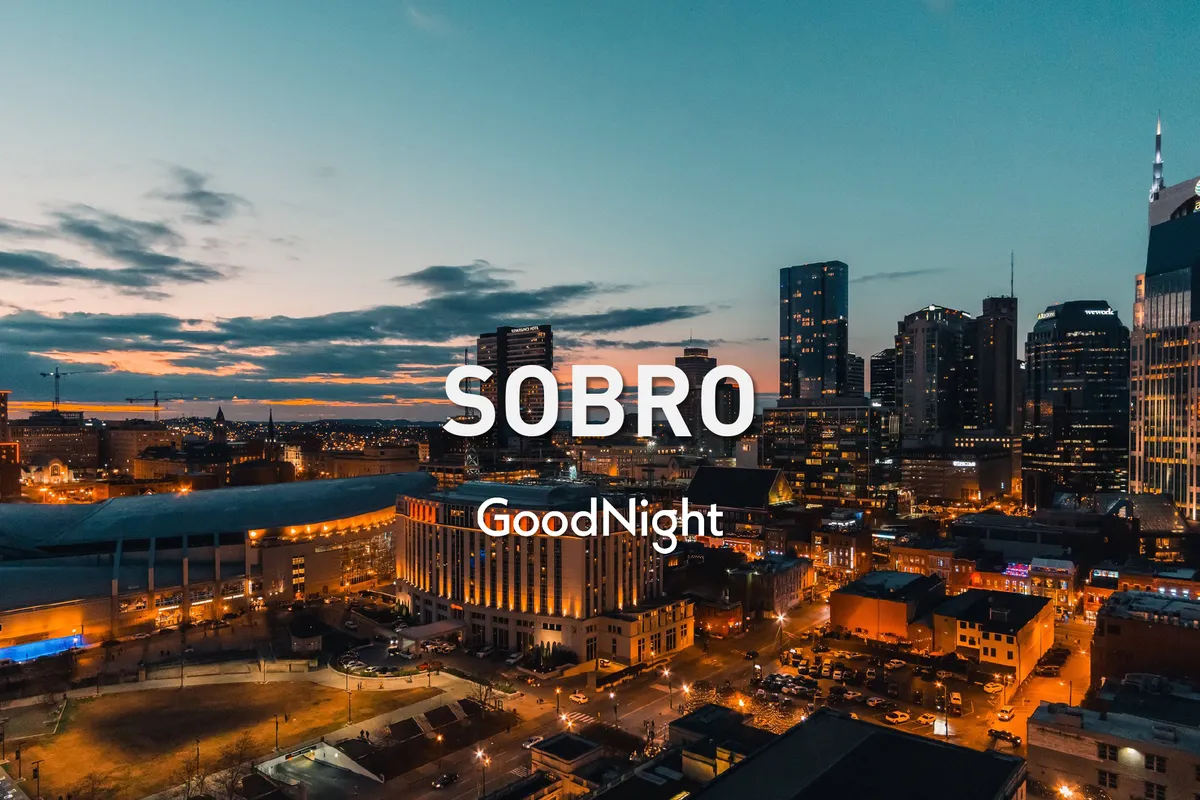 A panoramic view of the city skyline during sunset, showcasing prominent buildings and warm, inviting colors. The mood suggests the anticipation of evening events, rooftop gatherings, and nightlife exploration.